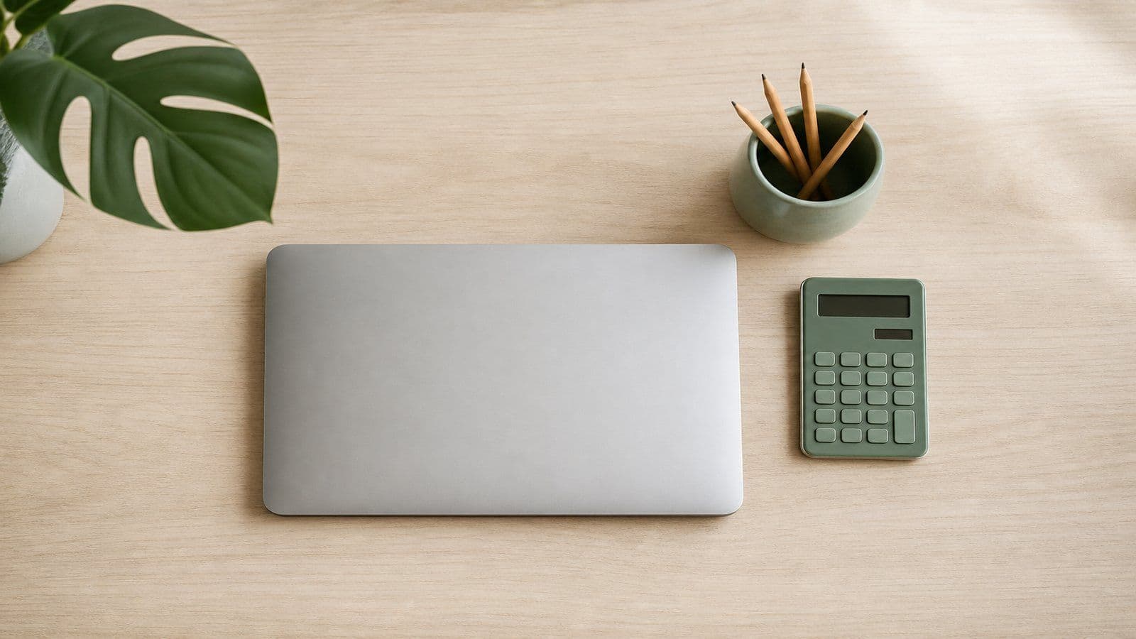 An organized desk ready for a weekly bookkeeping session