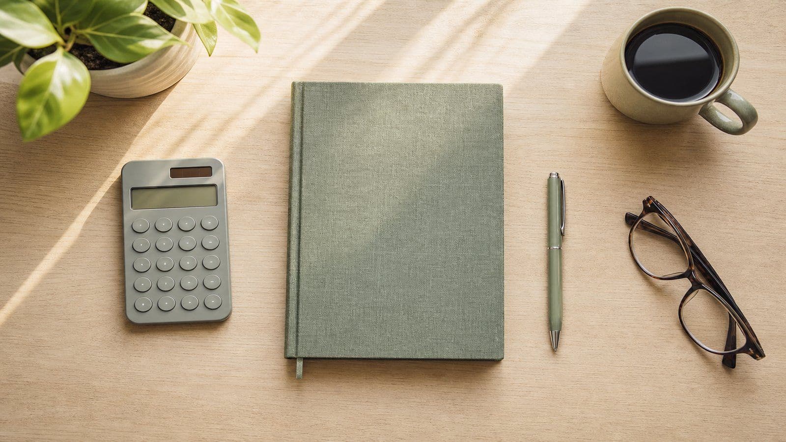 A tidy desk set up to start a fresh set of business books